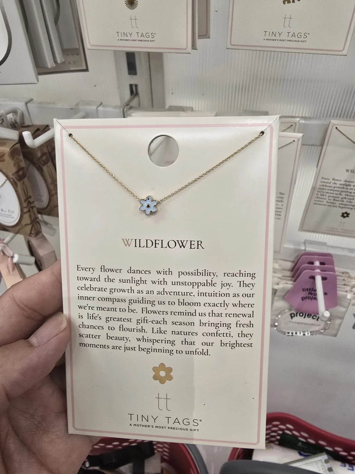 Tiny Tags Wildflower 小花吊坠项链故事卡正面,蓝色珐琅小花加一段文案